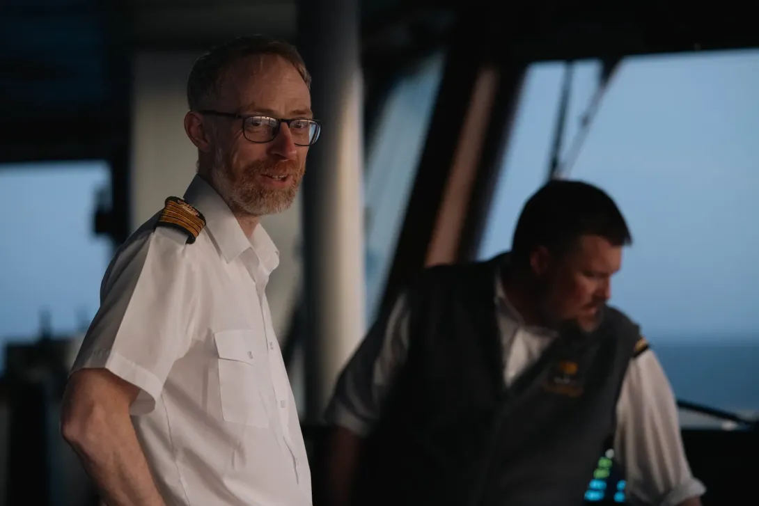 Stewart Mackay, Captain of RRS Discovery, overlooks work on the expedition