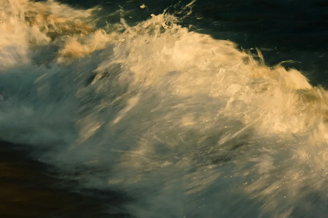 Sun reflecting on an ocean wave